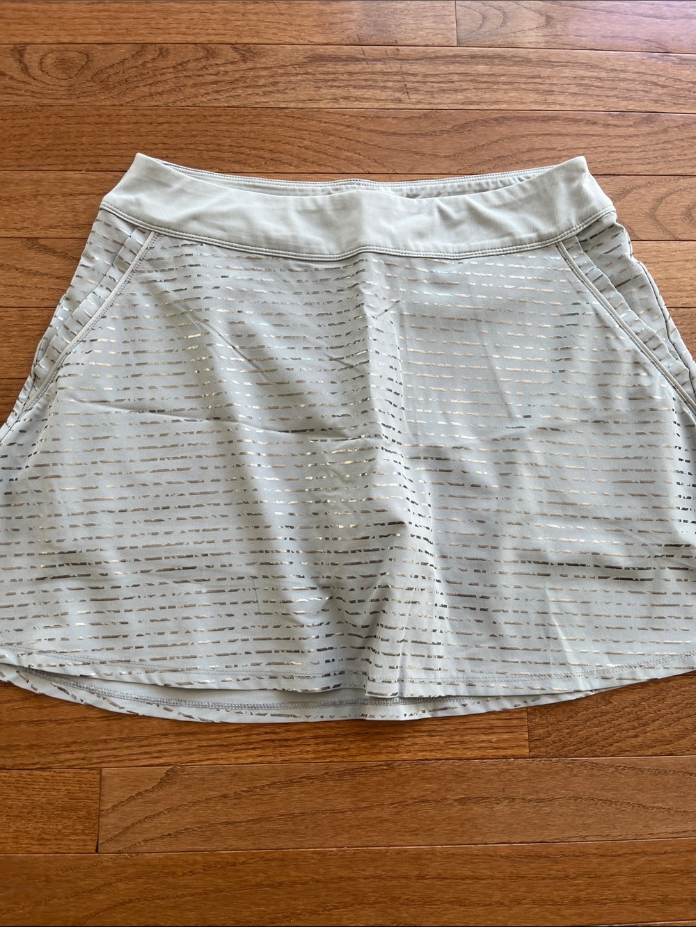 Under Armour Light Gray Skort with Metallic Stripe Accents